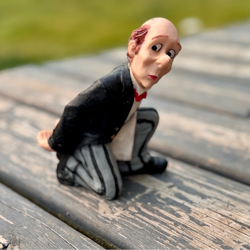 Charming Black and Gray Figurine